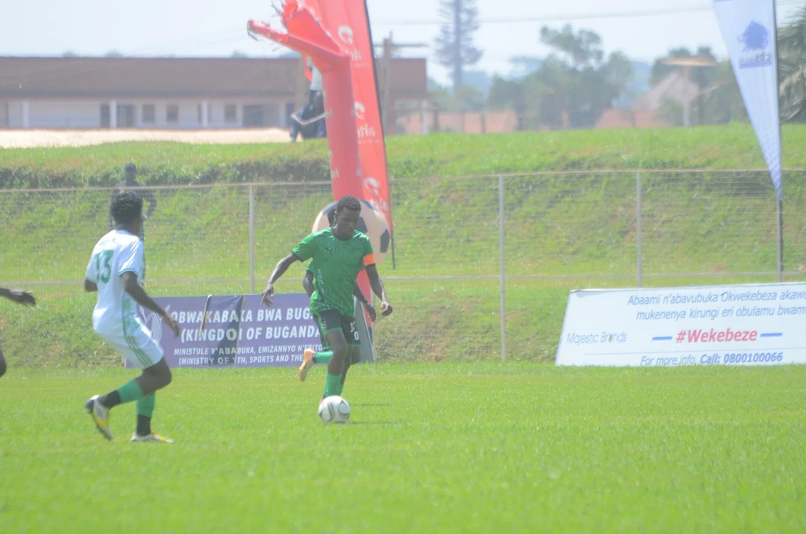 Nsenene and Kkobe clans playing in the 2025 Bika football third-place play-off in Uganda